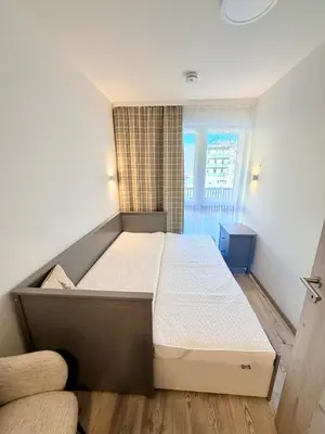 Ein Bett oder Betten in einem Zimmer der Unterkunft GG Apartment 7