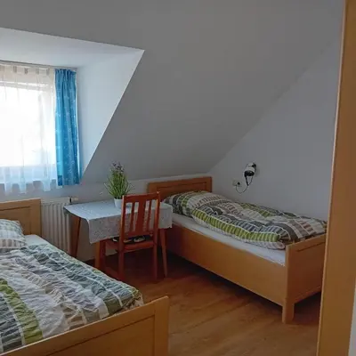 Ein Bett oder Betten in einem Zimmer der Unterkunft Ferienwohnung Dietz