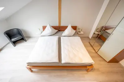 Ein Bett oder Betten in einem Zimmer der Unterkunft Sternenhimmel-Suite Kissing