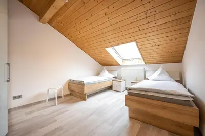 Ein Bett oder Betten in einem Zimmer der Unterkunft Sternenhimmel-Suite Kissing