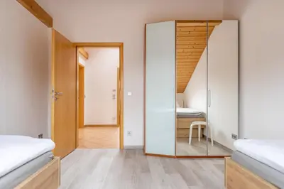 Ein Bett oder Betten in einem Zimmer der Unterkunft Sternenhimmel-Suite Kissing