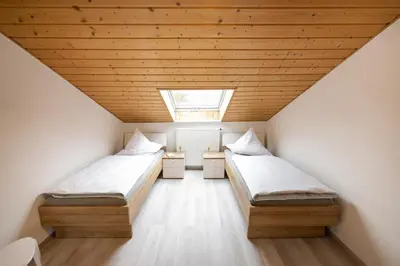Ein Bett oder Betten in einem Zimmer der Unterkunft Sternenhimmel-Suite Kissing