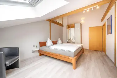 Ein Bett oder Betten in einem Zimmer der Unterkunft Sternenhimmel-Suite Kissing