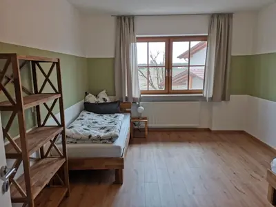 Ein Bett oder Betten in einem Zimmer der Unterkunft Ferienwohnung am Naglerhof
