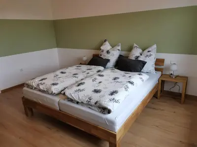 Ein Bett oder Betten in einem Zimmer der Unterkunft Ferienwohnung am Naglerhof