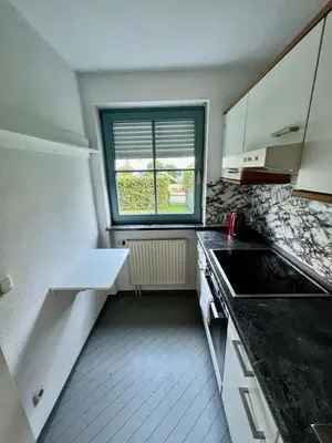 Küche/Küchenzeile in der Unterkunft Charmante Wohnung mit Terrasse , ruhig und zentral