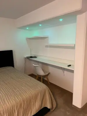Ein Bett oder Betten in einem Zimmer der Unterkunft Charmante Wohnung mit Terrasse , ruhig und zentral