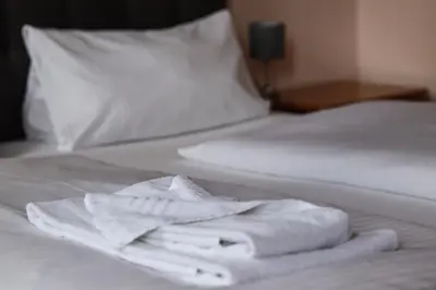 Ein Bett oder Betten in einem Zimmer der Unterkunft Restauration Schondorfer