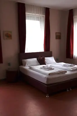 Ein Bett oder Betten in einem Zimmer der Unterkunft Restauration Schondorfer