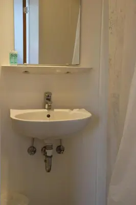 Ein Badezimmer in der Unterkunft Restauration Schondorfer