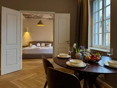 Ein Bett oder Betten in einem Zimmer der Unterkunft Designer-Apartment - Top-Lage - Fuggerei