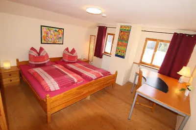 Ein Bett oder Betten in einem Zimmer der Unterkunft Villa Toscana - Ferienhaus im Garten