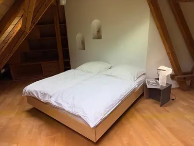 Ein Bett oder Betten in einem Zimmer der Unterkunft Historic elegance and modern comfort