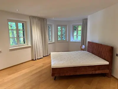 Ein Bett oder Betten in einem Zimmer der Unterkunft Historic elegance and modern comfort