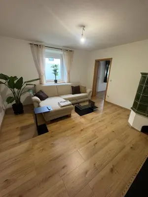 Ein Sitzbereich in der Unterkunft Moderne große Wohnung mit Garten