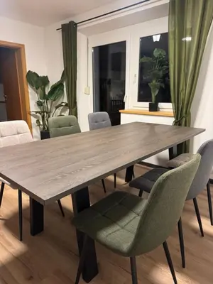 Ein Sitzbereich in der Unterkunft Moderne große Wohnung mit Garten