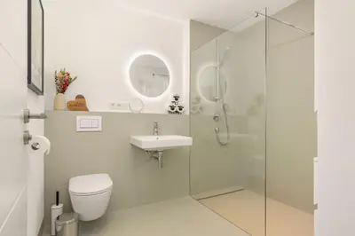 Ein Badezimmer in der Unterkunft Alpen Lodge Samerberg