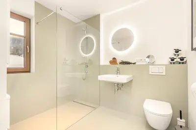 Ein Badezimmer in der Unterkunft Alpen Lodge Samerberg