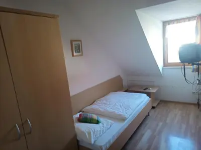 Ein Bett oder Betten in einem Zimmer der Unterkunft Apartment Nord-Amerika DG