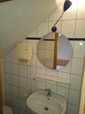 Ein Badezimmer in der Unterkunft Apartment Nord-Amerika DG