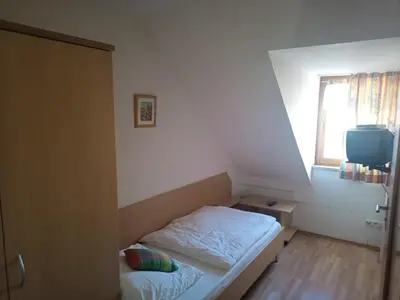Ein Bett oder Betten in einem Zimmer der Unterkunft Apartment Nord-Amerika DG