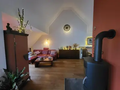 Ein Sitzbereich in der Unterkunft FRIDA - Dachpalais, nahe City, HBF und Wertach-Park