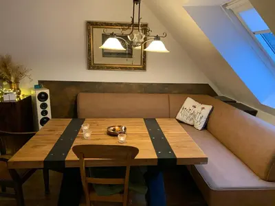 Ein Sitzbereich in der Unterkunft FRIDA - Dachpalais, nahe City, HBF und Wertach-Park