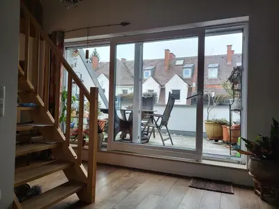 Ein Balkon oder eine Terrasse in der Unterkunft FRIDA - Dachpalais, nahe City, HBF und Wertach-Park