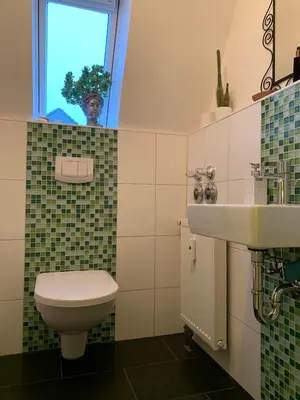 Ein Badezimmer in der Unterkunft FRIDA - Dachpalais, nahe City, HBF und Wertach-Park