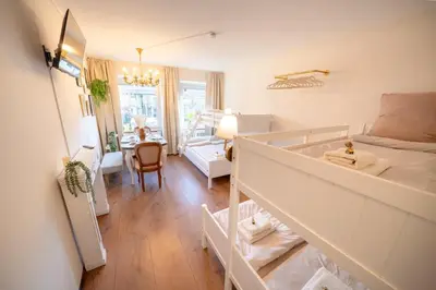 Ein Bett oder Betten in einem Zimmer der Unterkunft Retro City Apartment mitten in der Altstadt
