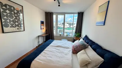 Ein Bett oder Betten in einem Zimmer der Unterkunft BeckHomes Munich, Stylish, central & modern 3BR Apartment up to 7 Pax