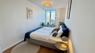 Ein Bett oder Betten in einem Zimmer der Unterkunft BeckHomes Munich, Stylish, central & modern 3BR Apartment up to 7 Pax