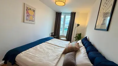 Ein Bett oder Betten in einem Zimmer der Unterkunft BeckHomes Munich, Stylish, central & modern 3BR Apartment up to 7 Pax