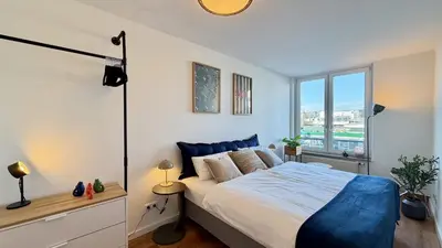 Ein Bett oder Betten in einem Zimmer der Unterkunft BeckHomes Munich, Stylish, central & modern 3BR Apartment up to 7 Pax