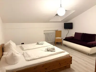 Ein Bett oder Betten in einem Zimmer der Unterkunft Gschwendtnerhof App12 Göbel