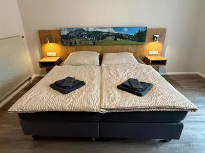 Ein Bett oder Betten in einem Zimmer der Unterkunft Wohnen am Fuße der Burg