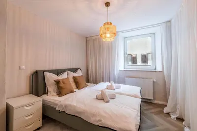 Ein Bett oder Betten in einem Zimmer der Unterkunft Modernes Design-Apartment in Augsburger Altstadt