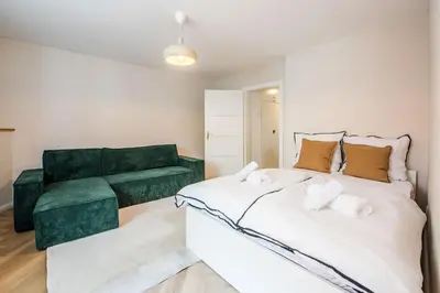 Ein Bett oder Betten in einem Zimmer der Unterkunft Modernes Design-Apartment in Augsburger Altstadt