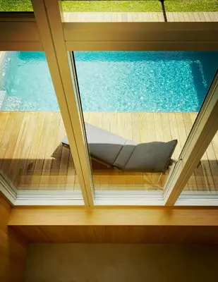 Der Swimmingpool an oder in der Nähe von Alpine Chalet With Heated Pool In Lenggries