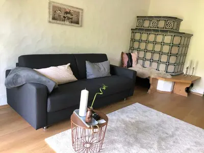 Ein Sitzbereich in der Unterkunft Bergblick Kampenwand