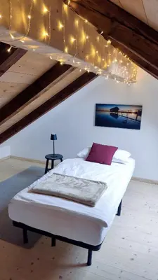 Ein Bett oder Betten in einem Zimmer der Unterkunft Ferienwohnung am alten Kino