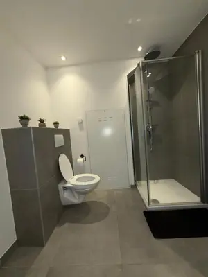 Ein Badezimmer in der Unterkunft Modernes Dachgeschoss