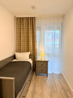 Ein Bett oder Betten in einem Zimmer der Unterkunft GG Apartment 8