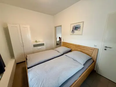 Ein Bett oder Betten in einem Zimmer der Unterkunft FeWo Gretl Stauden