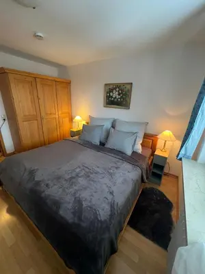 Ein Bett oder Betten in einem Zimmer der Unterkunft Ruhige Ferienwohnung in Bad Wiessee