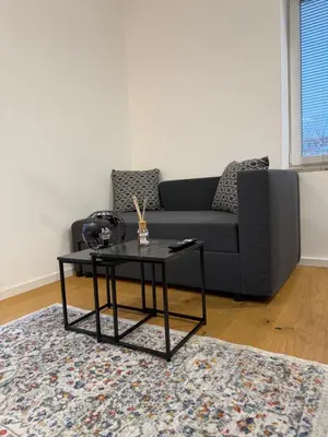 Ein Sitzbereich in der Unterkunft Studio Apartment