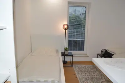 Ein Bett oder Betten in einem Zimmer der Unterkunft Studio Apartment