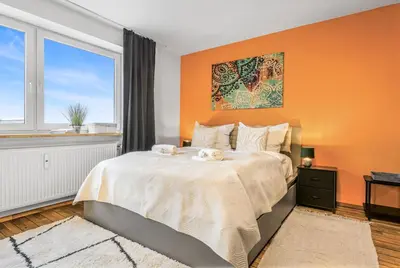 Ein Bett oder Betten in einem Zimmer der Unterkunft Apartment am Klenzepark-Citynah-SelfCheckIn