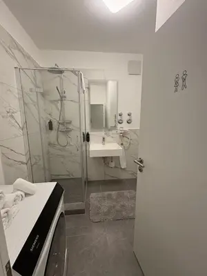 Ein Badezimmer in der Unterkunft Große City Wohnung Rosenheim 4 Zimmer, 7 Betten