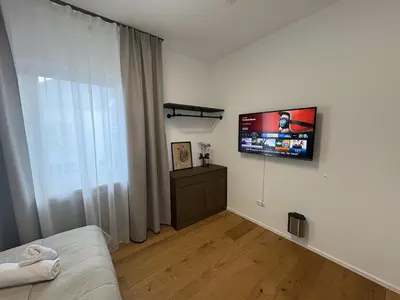 TV/Unterhaltungsangebot in der Unterkunft Große City Wohnung Rosenheim 4 Zimmer, 7 Betten